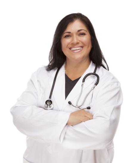 Nurse in labcoat standing and smiling